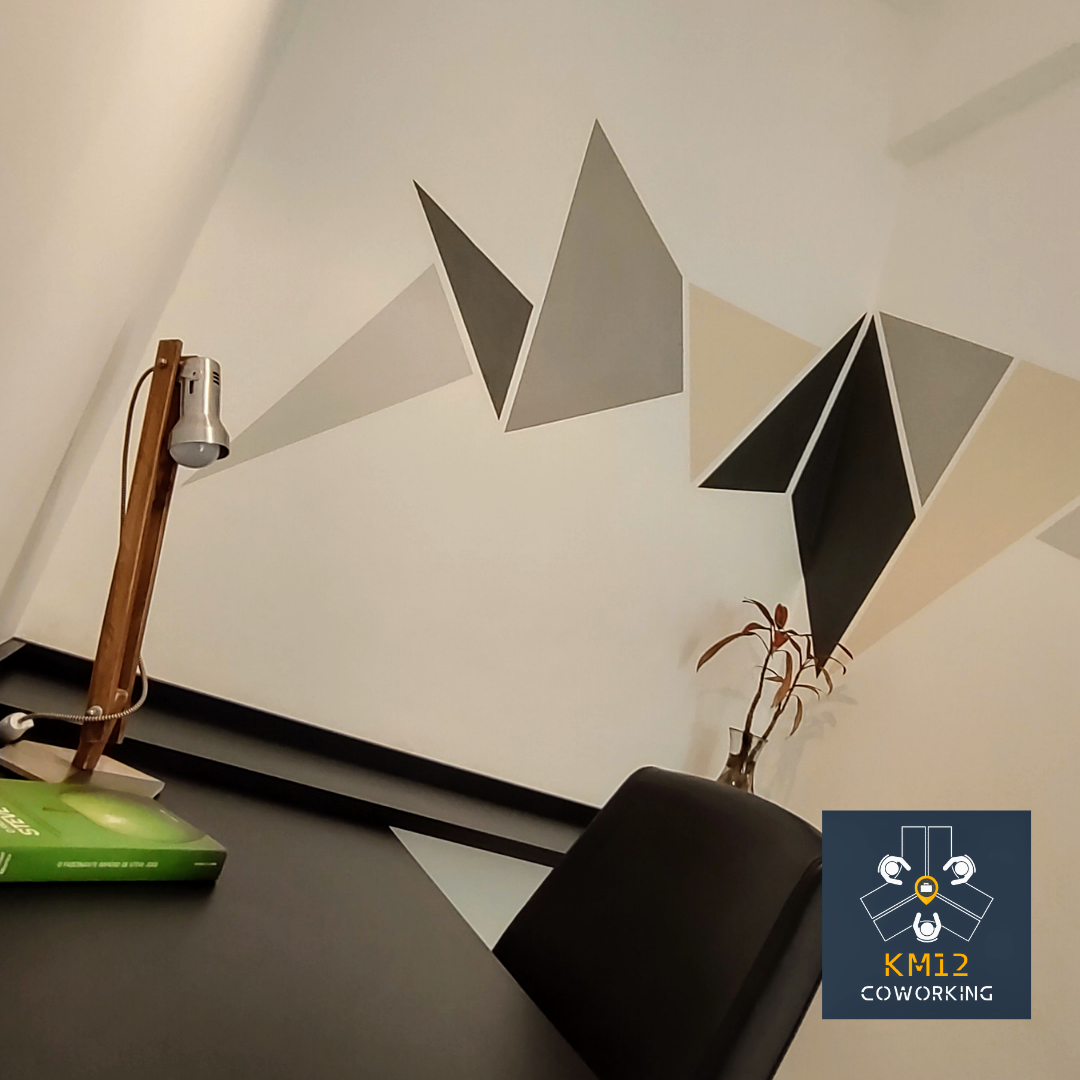 Logotipo KM12 Coworking